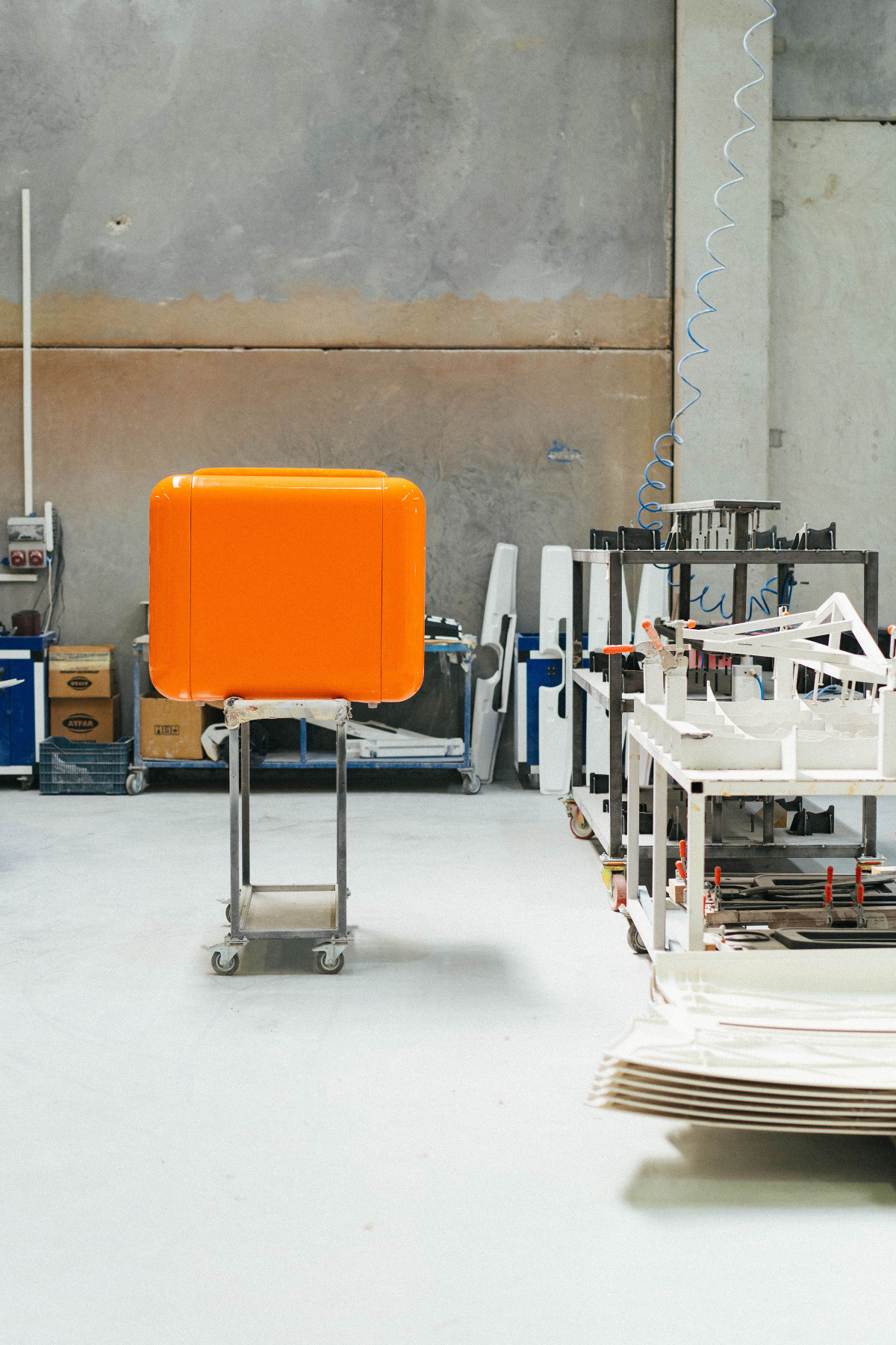 T4 Collection chair on wheeled shelf