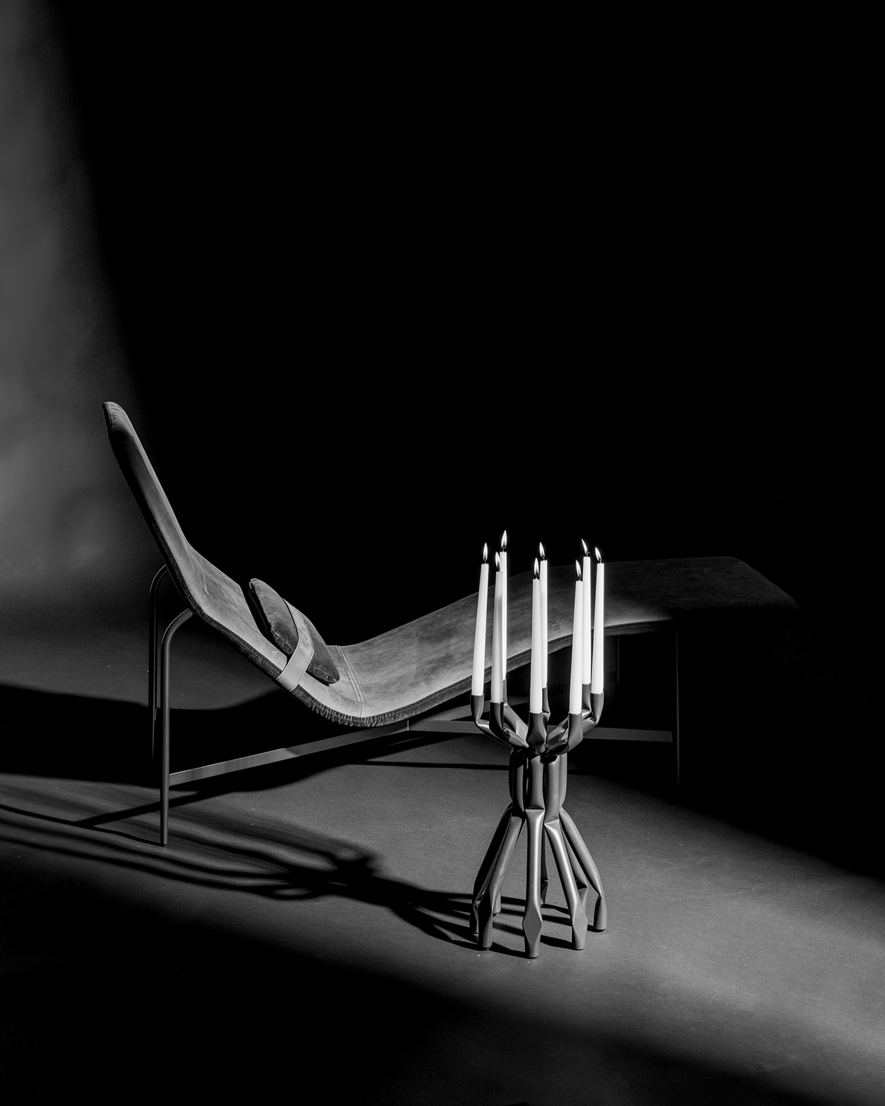 blu dot chaise and candelabra high-end furniture design